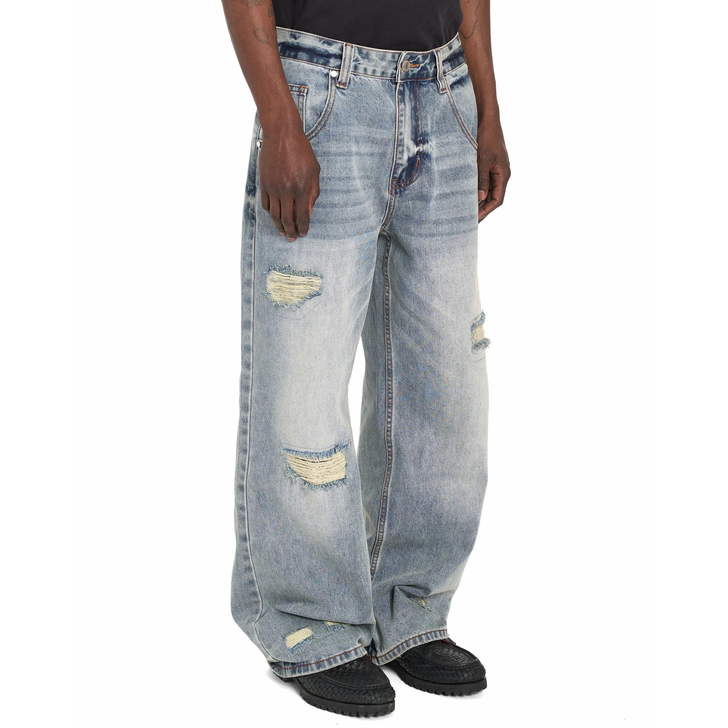 Light Blue Wide-Leg Distressed Jeans with Red Back Patch