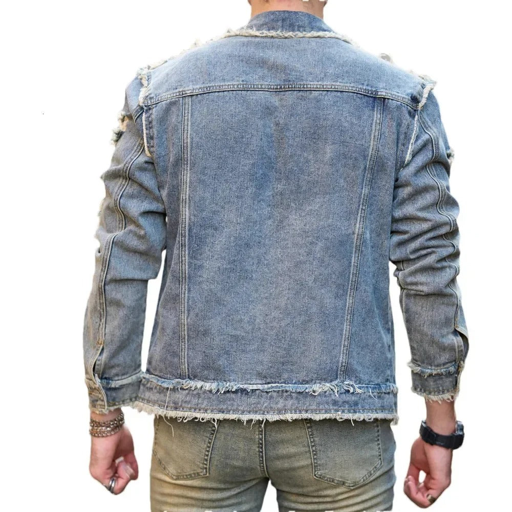 Faded Blue Denim Jacket with Frayed Edges and Distressed Details